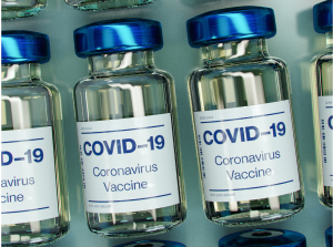 A stock photo of COVID-19 vaccine ampules.